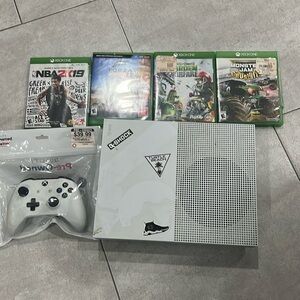 Xbox one s works fine 
Comes with controller and games to get you started